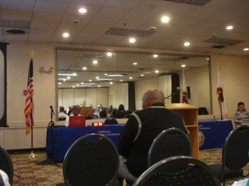 Pick out the security guy.